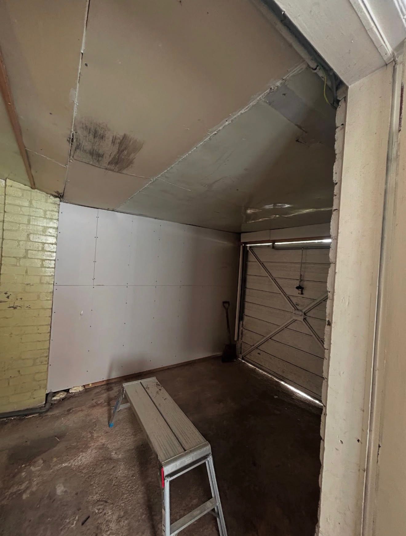 Harwood garage conversion structural roof opening for skylight