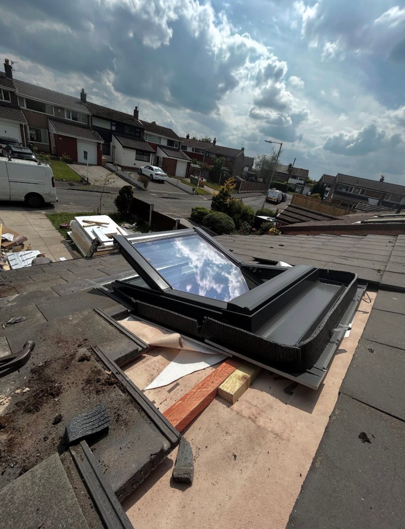 Harwood garage conversion interior with natural light from skylight