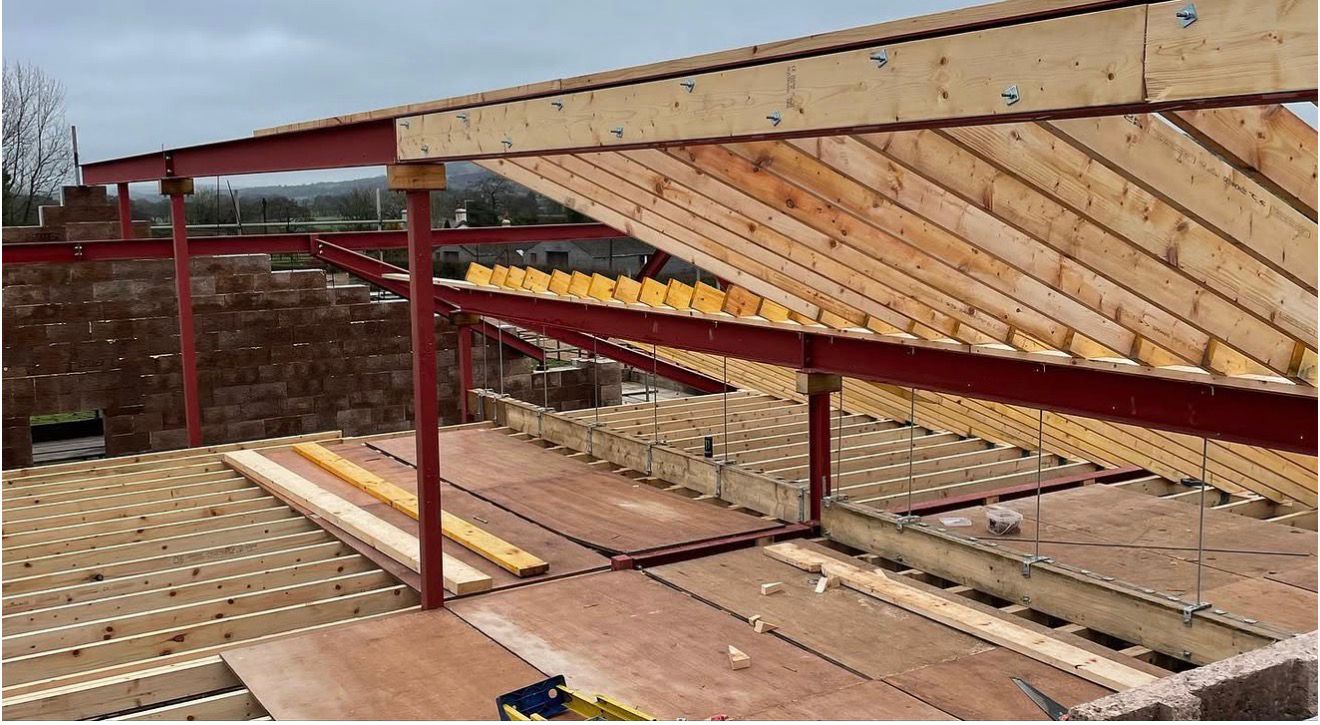 Structural roof carpentry felt and batten stage