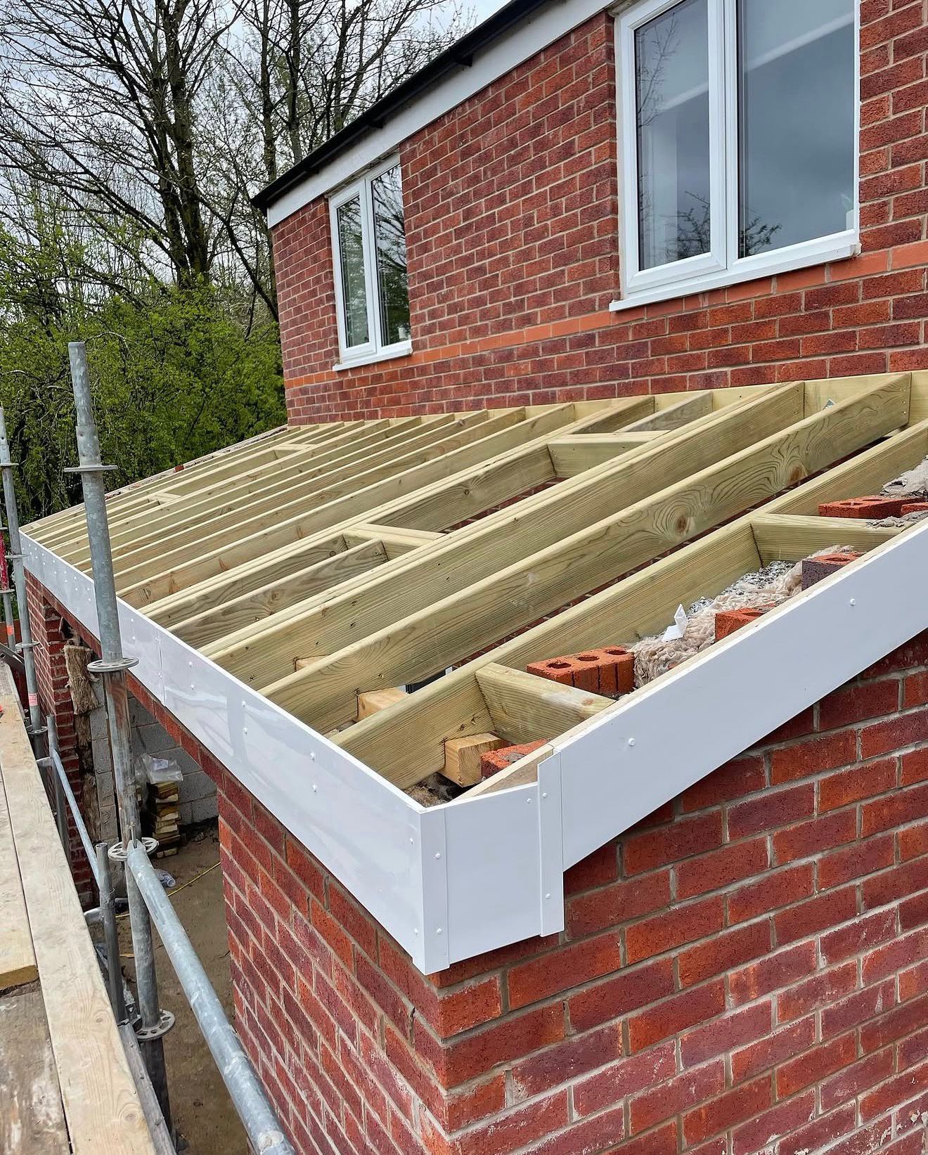 Trussed roof framing and truss-clip fixings